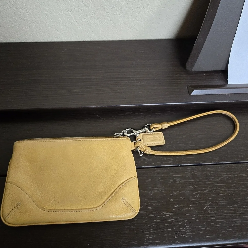 Coach yellow leather wristlet